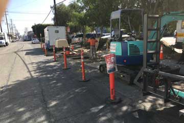 Preparing to jackhammer street for trenchless sewer replacment in Los Angeles, CA.